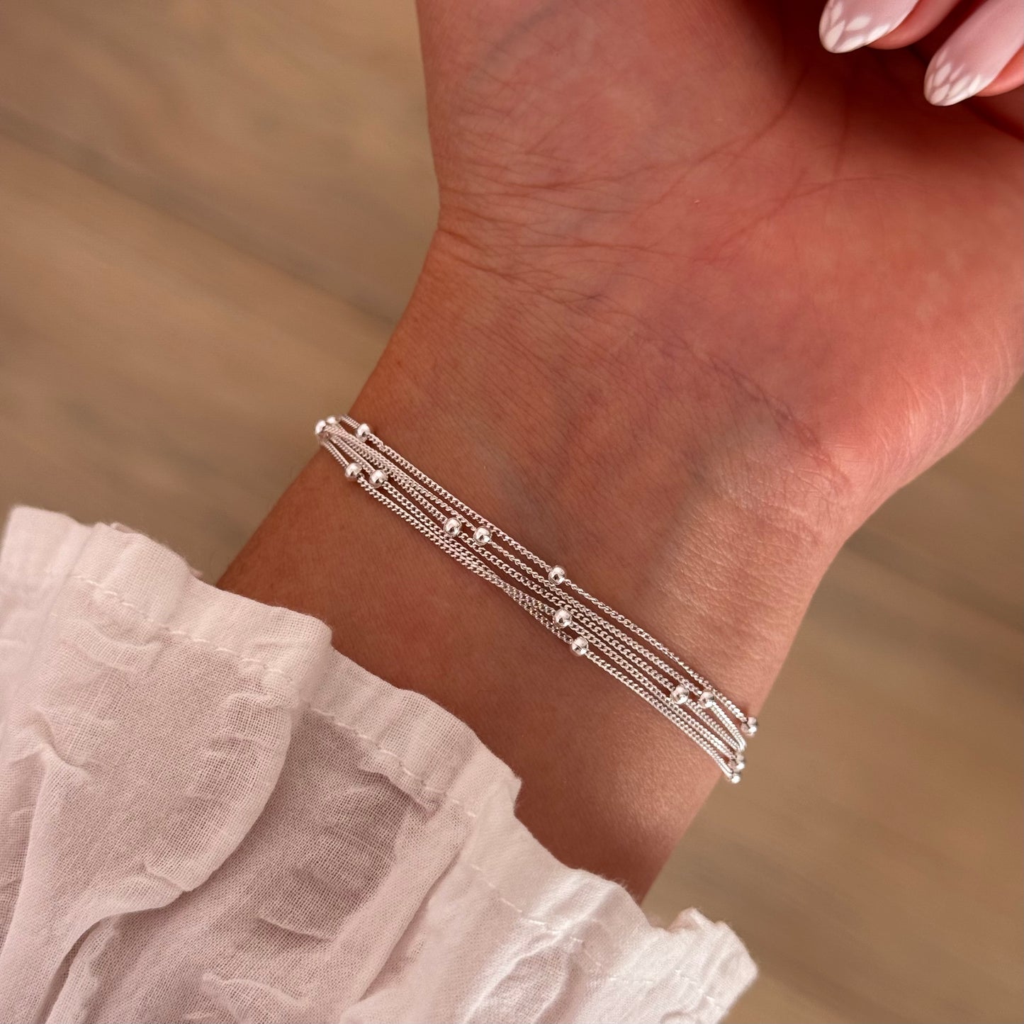 PULSERA MULTIHILO BOLITAS